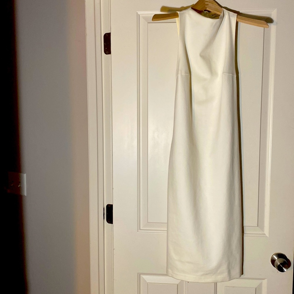 This dress is sexy and beautiful on hanger doesn’t do it justice only worn once